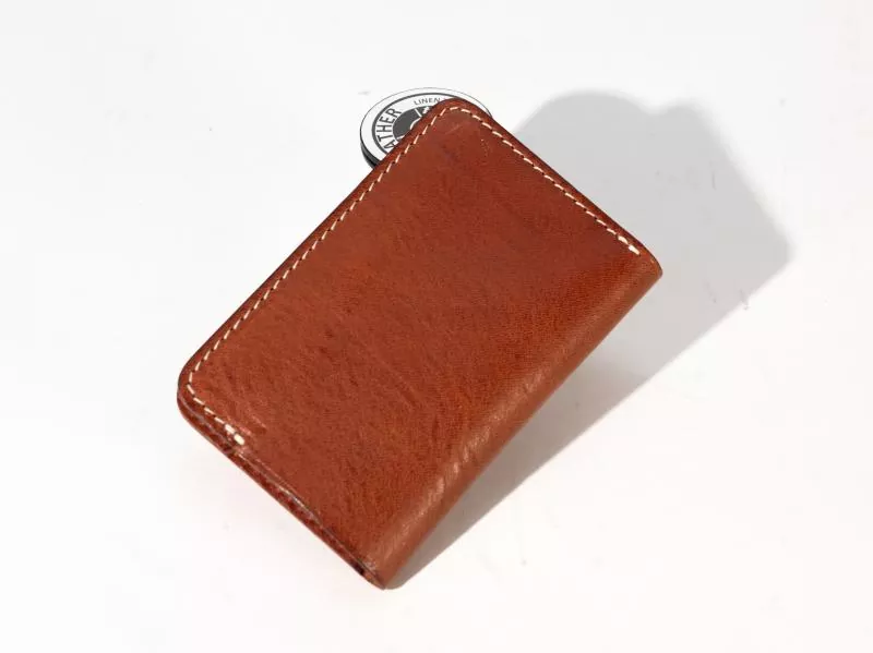 Le retour de la tendance rétro Portefeuille court en cuir véritable cousu main, le nouveau favori de la ville, alliant qualité et praticité