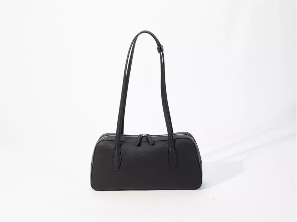 Comment choisir un sac sous les bras pour banlieue ? Un guide de comparaison complet : matériaux PVC et PU